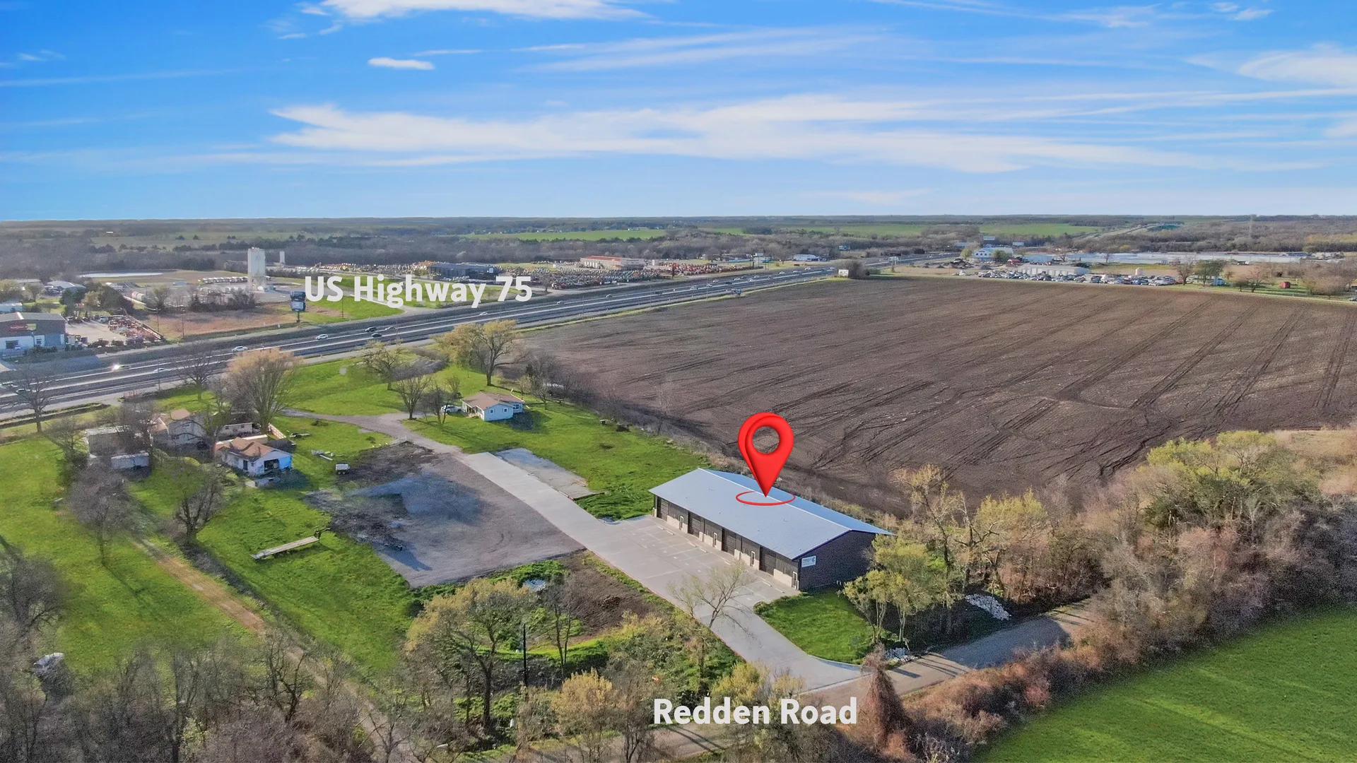 Drone view highlighting Triple C Business Park near US Highway 75 and Redden Road in Van Alstyne, Texas